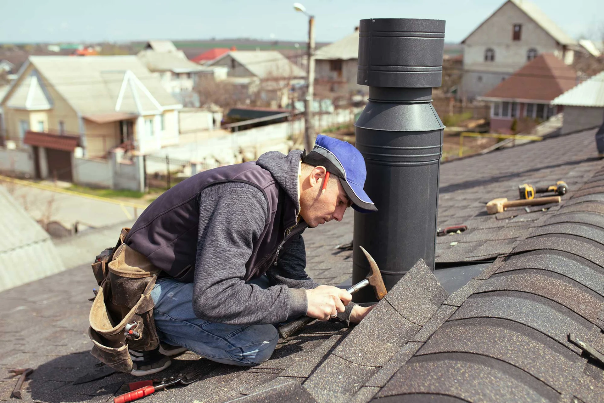 A Professional Master Roofer With Hammer Repairs 2022 04 25 12 52 41 Utc 1