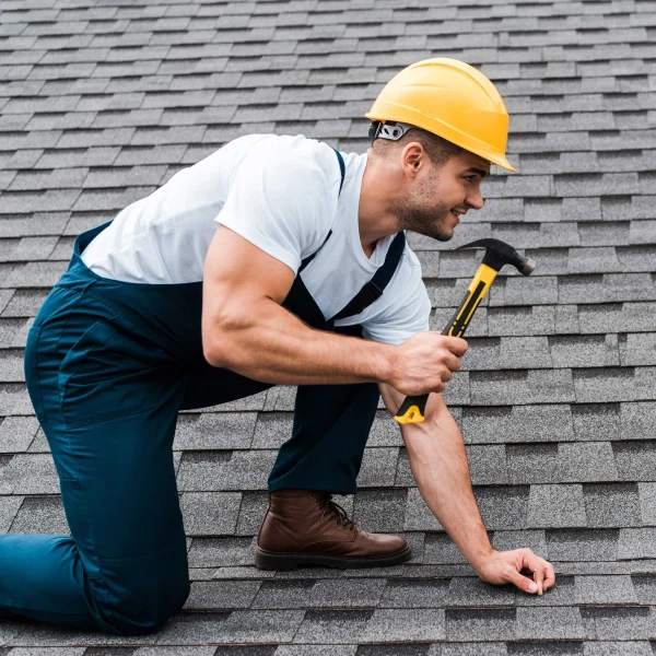 Repairman In Helmet Holding Hammer While Repairing 2022 12 16 20 00 29 Utc